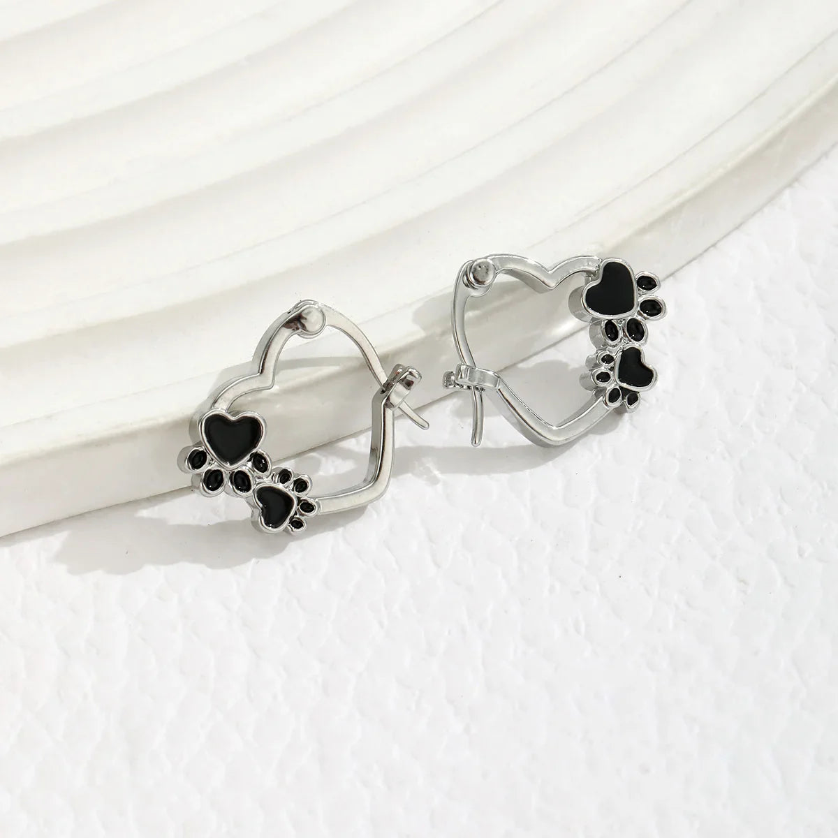 Paw Heart Huggie Earrings | Silver-tone Hoop Earrings | Black Enamel Accents | Pet Lover Jewelry 1